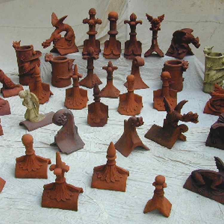 roof finial crest heads.jpg
